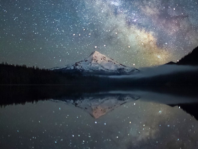A star field reflected in the water