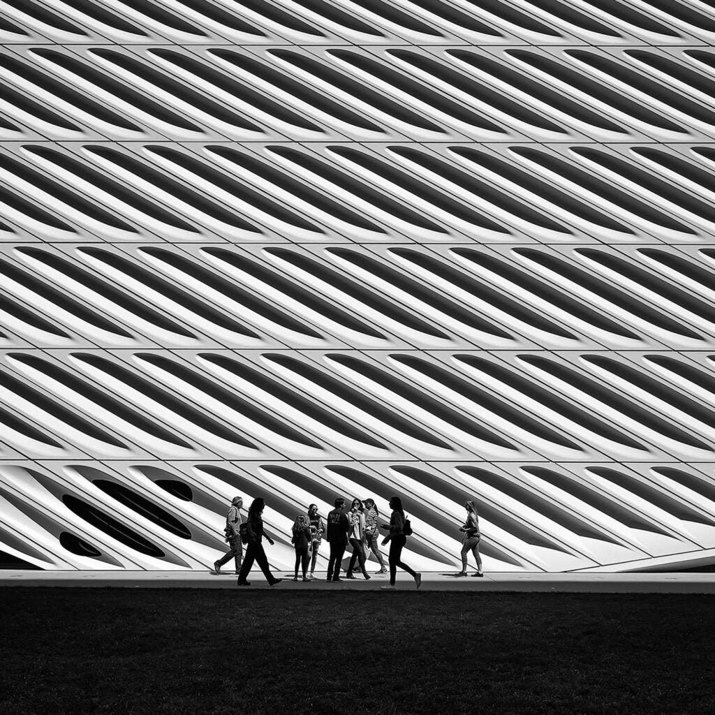 people walking by the Broad Building