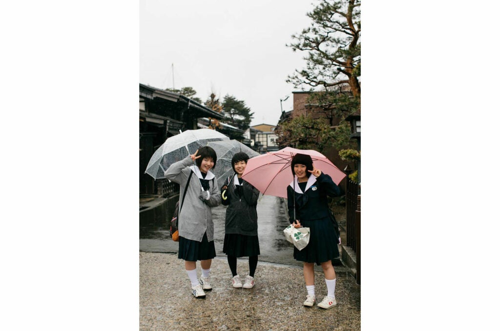Women with umbrellas