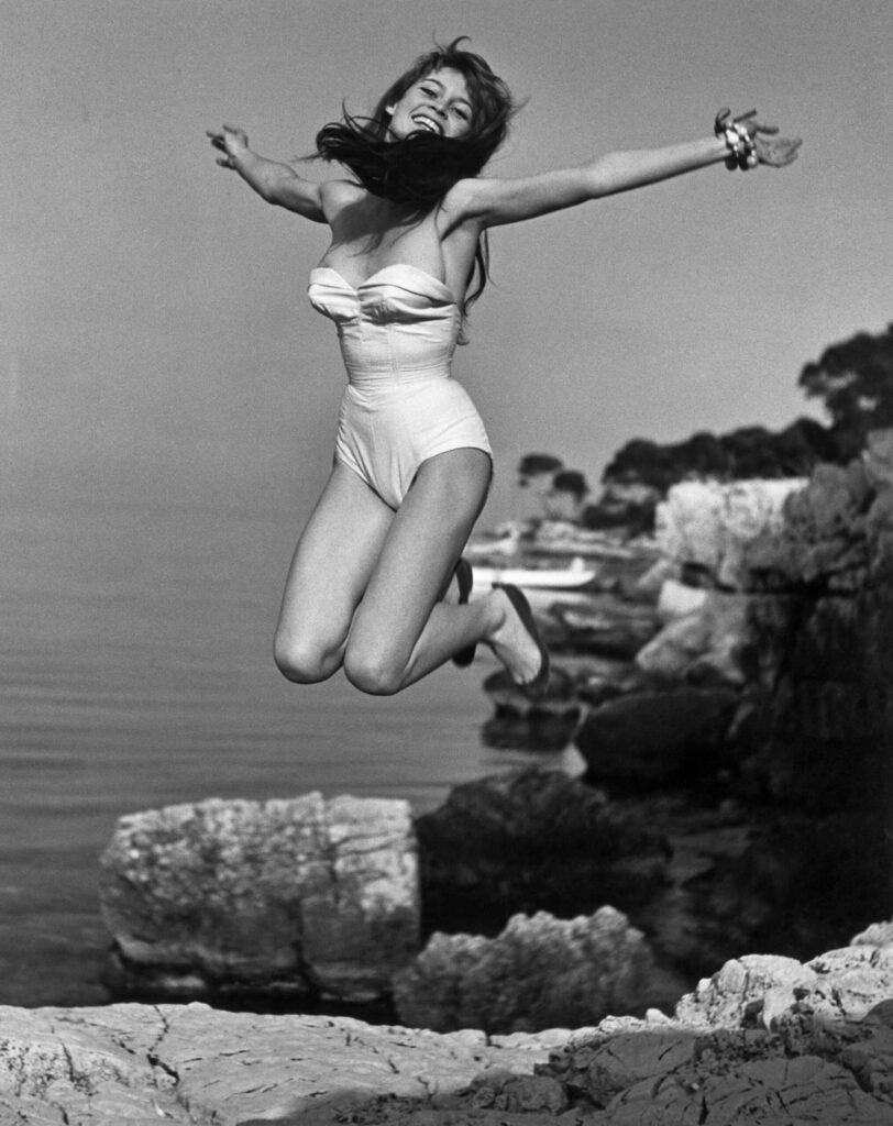 brigitte bardot jumping at beach