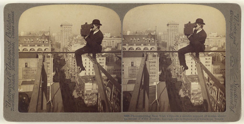 Photographing New York City - on a slender support 18 stories above pavement of Fifth Avenue