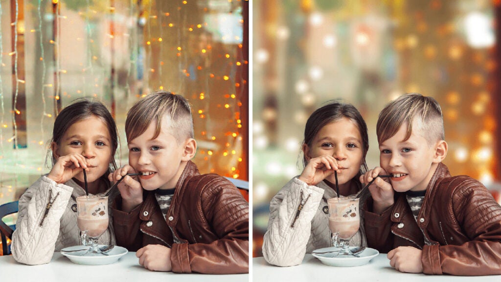 girl and boy sharing a milkshake with two straws