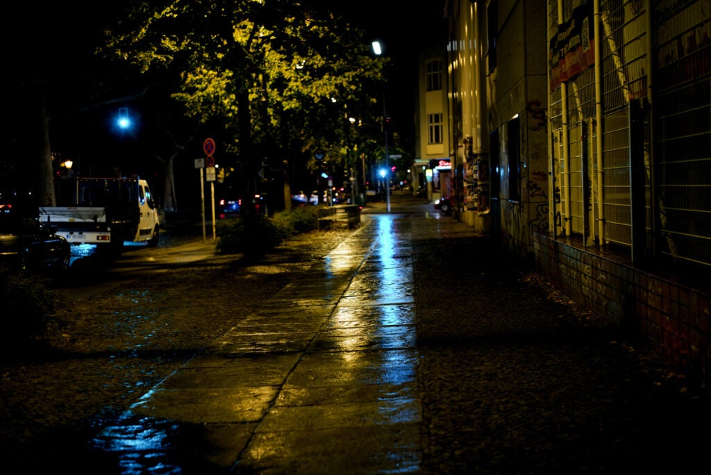 wet sidewalks at night
