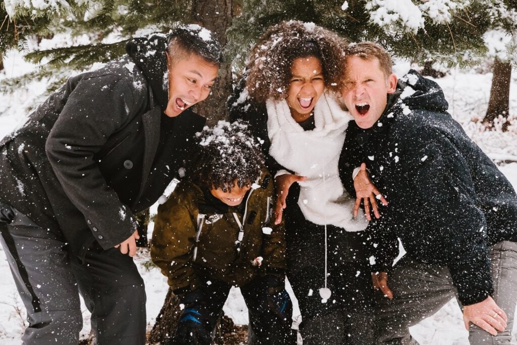 People laughing in the snow