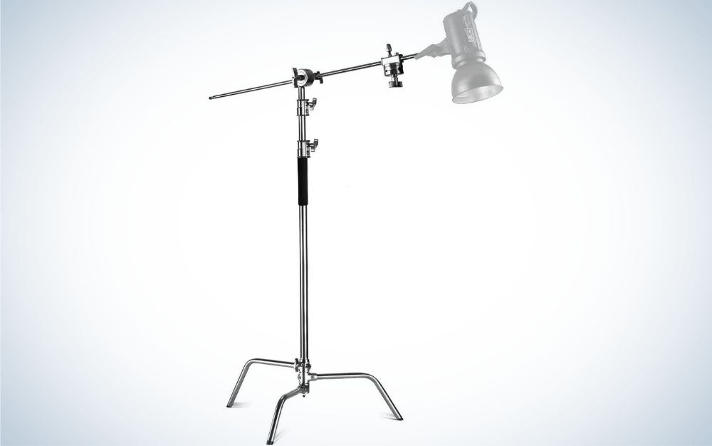 A hanging lamp with a simple gray head and a long holding rod with three metal legs.