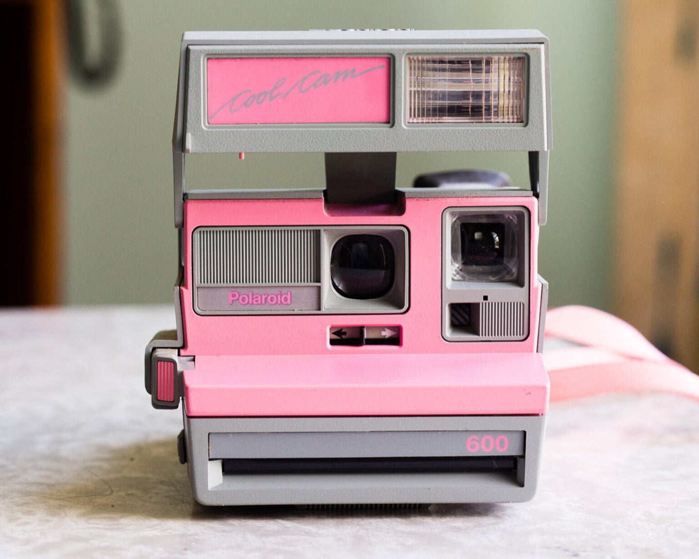 A pink instant camera
