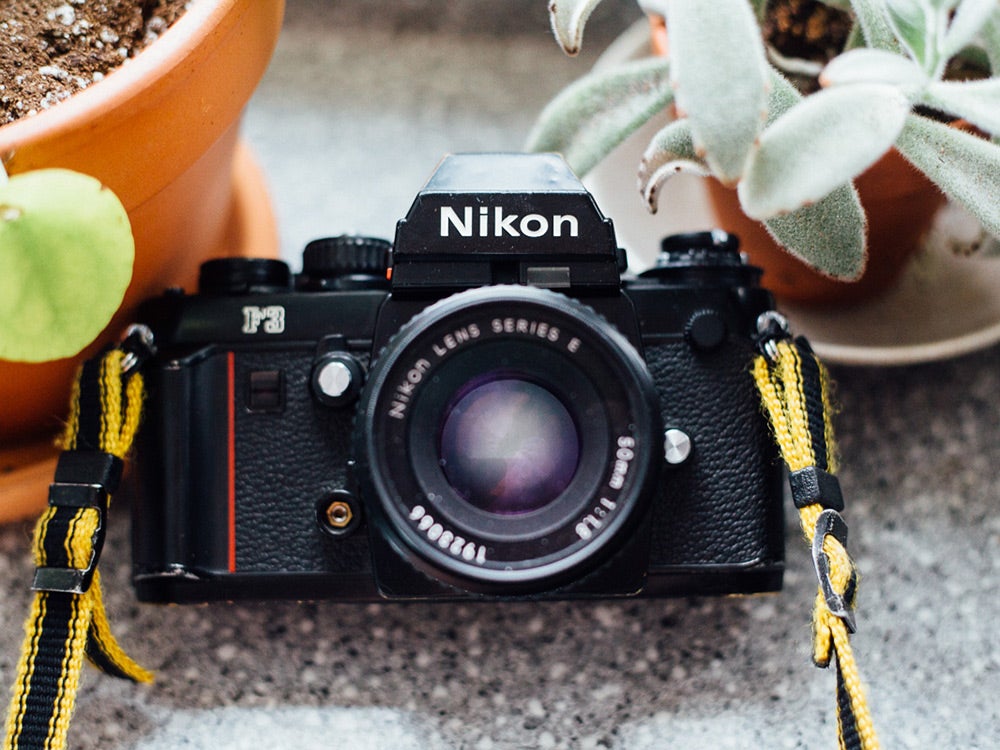 Nikon F3 camera with yellow strap