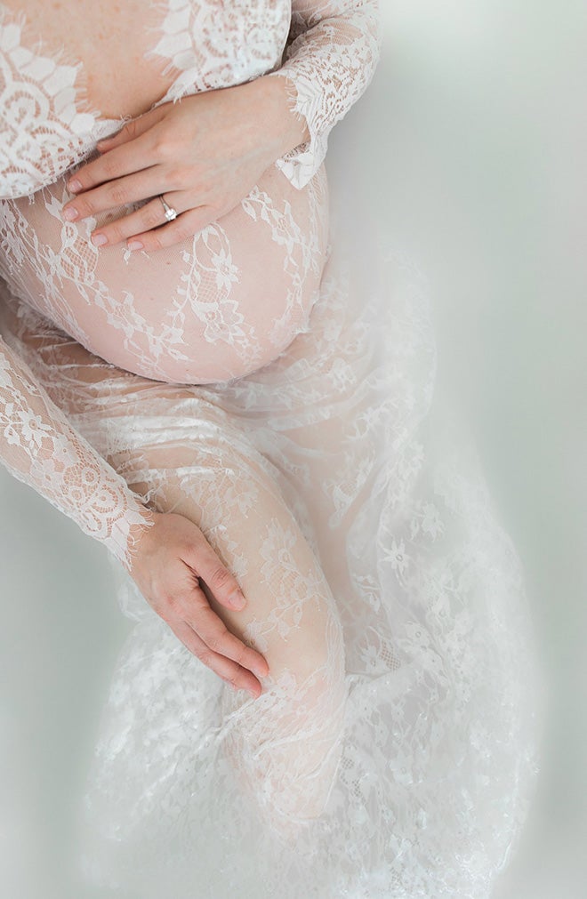 pregnant woman and lace in a milk bath