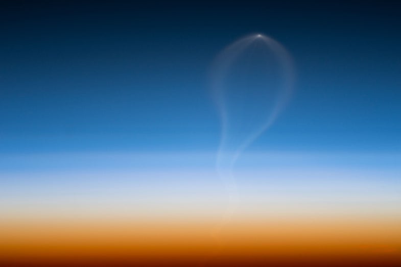 Image of an Atlas V rocket launch from the space station