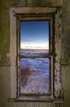 I was out shooting winter sunrises when I decided to go into an old abandoned house near the Wildcat Hills in western Nebraska. I like the composition of the sunrise snow scene through the broken window. I set the camera up on the tripod and composed the scene. I exposed for the scene outside and light painted the window frame with my head lamp. Canon 7D, Sigma 10-20 4-5.6, Manfrotto tripod, acratech ballhead, 4 sec, f11, ISO 800, 10mm.