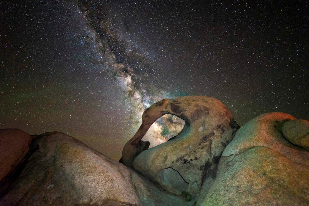 single image lightroom edit | sony a7s | rokinon 14mm f/4 | 15 sec | 8000k | camera focus light to brighten up the arch | as many times as i've been to the eastern sierras I haven't even scratched the surface of exploring everything this wonderful place has to offer. this adventure, i only had one thing on my mind. i have been envisioning the line up for months and when the time came i was so glad that i was there to witness it and the sky afforded me the clarity of the stars. this is alabama hills in lone pine home to many western movies and commercials of years past and present. mobius is just one of the many arches that can be found here. i believe they are in the hundreds of all sizes. this day, this night i only had this arch in mind. it's a glorious feeling when you accomplish what you set out to do. this was one of those moments.