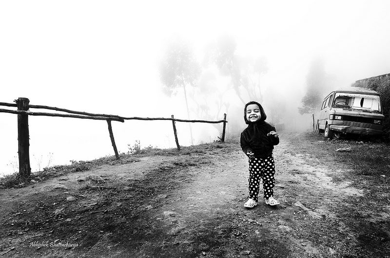 Mountain mist climbing up and my daughter expression with a chocolate !