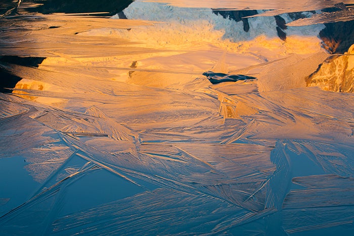 Macro abstract of Cerro Torre reflected in ice at Laguna Torre, Los Glaciares National Park, Patagonia, Argentna.