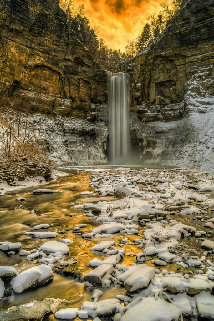 Taken last December of Taughanock Falls in Ithaca, NY.  I often been there when very little water was falling, but this time was magnificent.