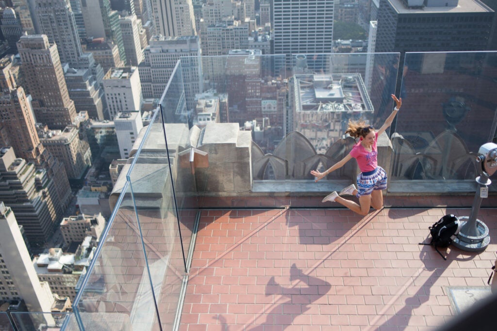 I wasn’t expecting this NYC tourist to jump, but I was glad she did. The focus got her with no problem.