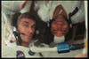 astronauts together in space