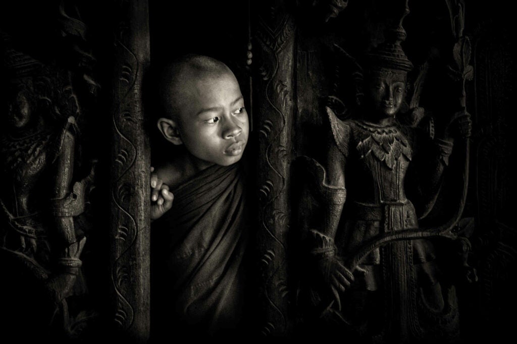 Salay is situated in the middle of Myanmar and famous for ancient wooden monasteries.This picture was taken at the beautifully curved wooden door in one of the monastery.