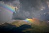Rainbow among dark clouds in Katmai Alaska