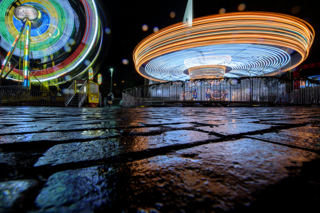 Today's Photo of the Day comes from Ben Roffelsen and was taken at the Toronto Christmas Market using a Nikon D750 with a 14-24 mm f/2.8 lens. Roffelsen used a long exposure at f/16 and ISO 100 and a very low angle to capture this scene. See more work <a href="https://www.flickr.com/photos/benroffelsen/">here. </a>