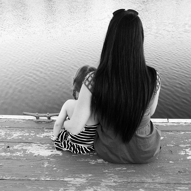 Photo: Desiree Manwiller This photo was taken at Ocean Pines Maryland. My 3 year old niece and I were sitting on the end of the dock overlooking the bay to Ocean City.