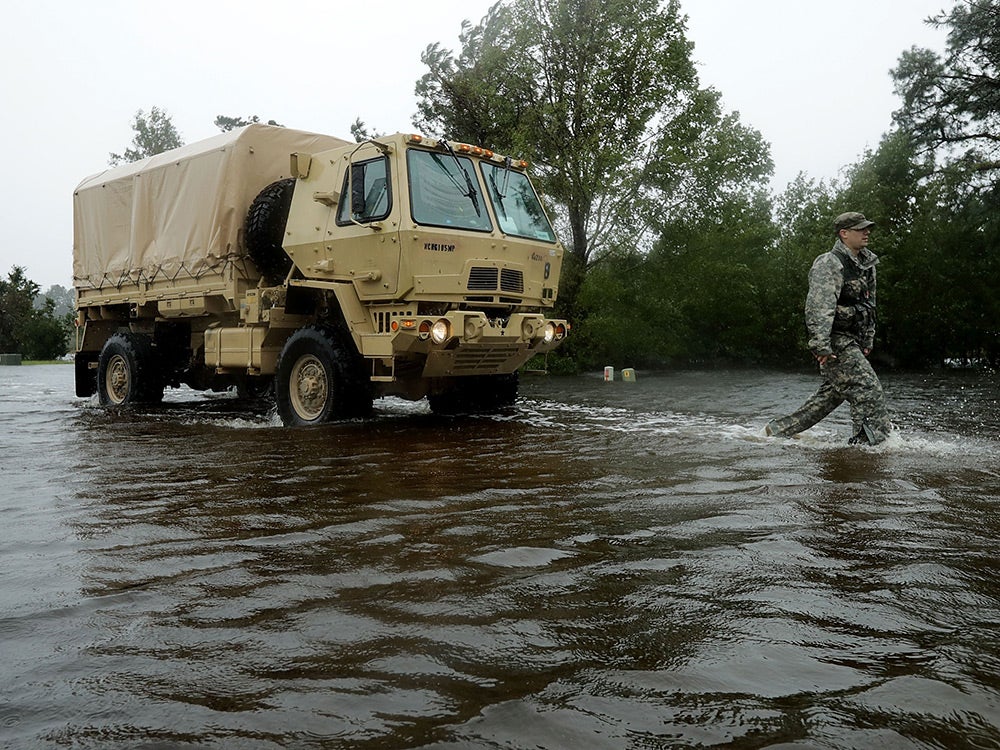 National Guard 105th Military Police Battalion from Asheville search for evacuees