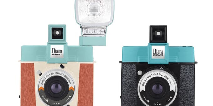 An Instax Square camera with interchangeable lenses and hotshoe flash? Yes please.