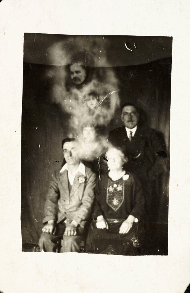 Family group with two spirits