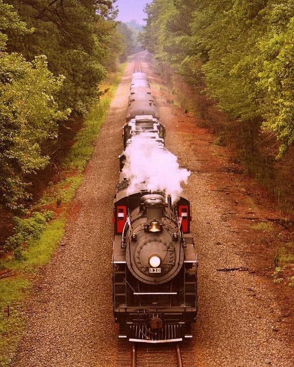 When and where was the photo taken? August 2012 in Flowery Branch Georgia.Tech specs: ISO 100, 1/1500 sec, f/4.5Processing: Warmed the tones and added a subtle glow to give it an aged-look.Description: The train is Southern Steam Engine 630 Want to be featured as our Photo of the Day? Submit your best work HERE.