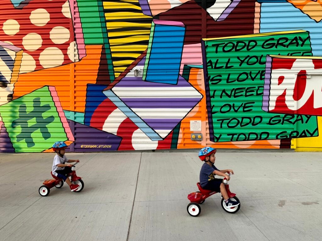 Kids on trikes shot with iPhone XS Max