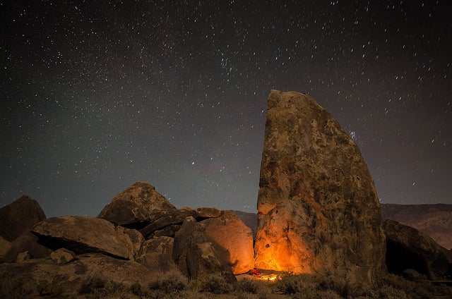Today's Photo of the Day comes from Hadley Johnson and was taken using a Nikon D5100 with a 16.0 mm f/2.0 lens. "This is a minute and a half exposure at ISO 200," Johnson writes regarding how the image was made. "The only illumination, except for the campfire, was a waxing moon at 35.5 percent." See more work <a href="http://www.flickr.com/photos/94314925@N03/">here. </a>