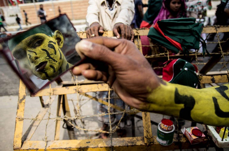 Today's Photo of the Day was taken by Flickr user AriFoto during the ICC World Cup T20 in Bangladesh. This cricket fan had painted his body like a tiger to support his team. See more of AriFoto's work <a href="http://www.flickr.com/photos/101612837@N04/">here. </a>