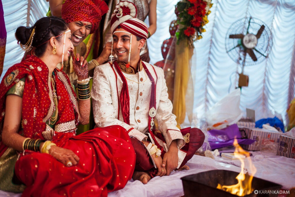 Today's Photo of the Day was captured by Karan Kadam during a friend's wedding in India. "This is an old Maharashtrian tradition where the brother of the Bride (seen the background) twists the ear of the Groom (you better take care of her gesture)," Kadam writes of the image. He shot on a Canon EOS 5D Mark II with a EF 50mm f/1.4 USM lens at 1/250 sec, f/2 and ISO 100. See more work <a href="https://www.flickr.com/photos/karankadam/">here. </a>