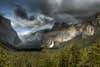 Forming of a double rainbow over the Yosemite Valley at the Wawona Tunnel overlook.