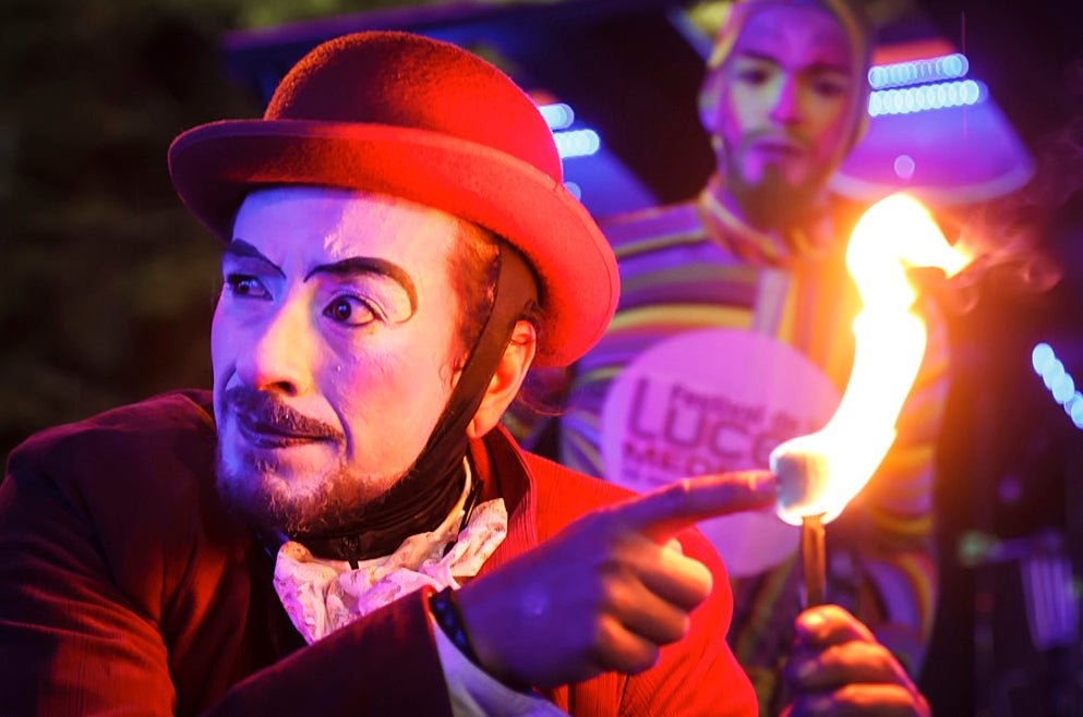 Today's Photo of the Day comes from Daniel Romero and was taken during the Festival de Luces in Medellin, Colombia. Romero used a Canon EOS 7D with a 24-70mm lens at 1/100 sec, f/2.8 and ISO 2500 to capture these two performers. See more of his work <a href="http://www.flickr.com/photos/dafero/">here.</a>