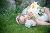 bride posing in the grass