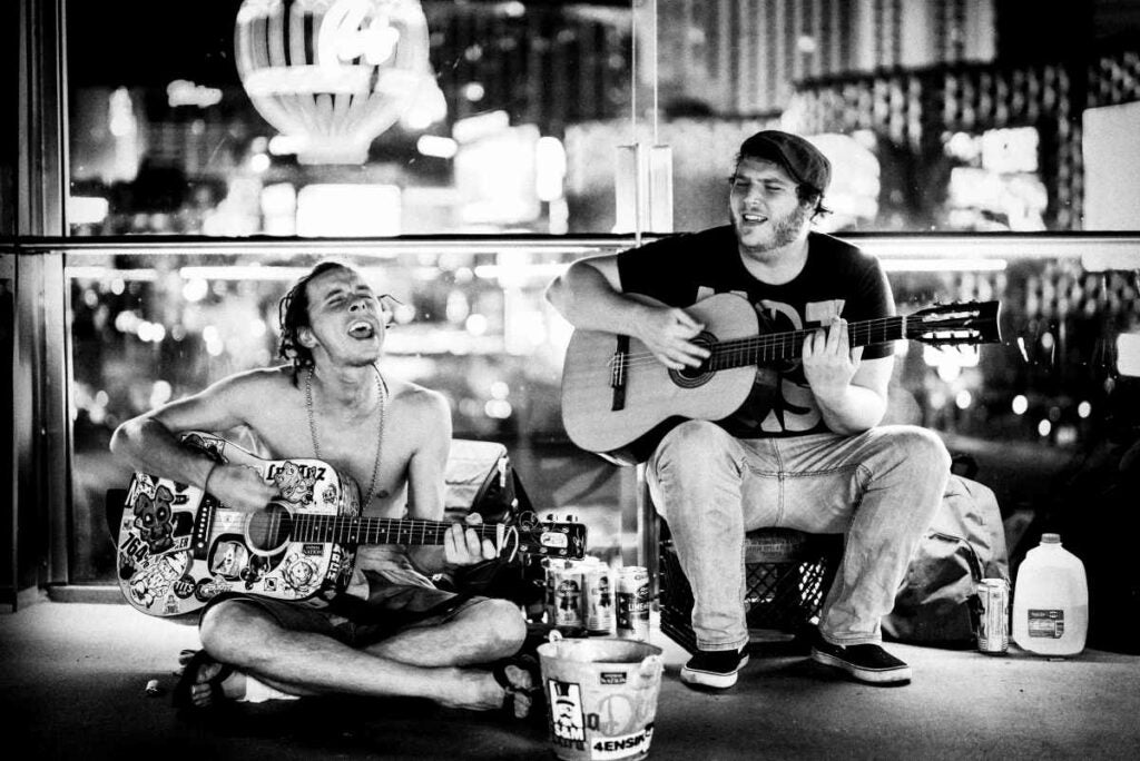 Rented a Nikon D810 and a Zeiss Otus 1.4/55mm and headed to Las Vegas Boulevard at night. Never had so much fun with a camera! These guys were rocking it, pretty badly I must say due to their intoxication level, On a pedestrian overpass. When I showed them the photo, the one on the left said "Wow, I didn't know we looked that good!" LoL