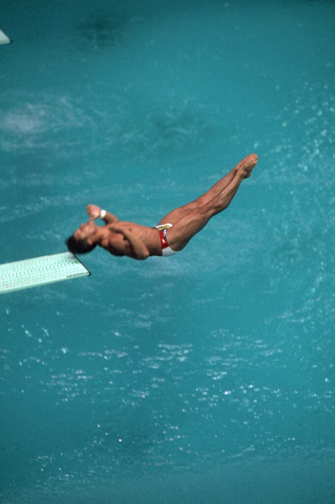 U.S. diver Greg Louganis making the dive during which he hit his head on the board while competing in Olympics.