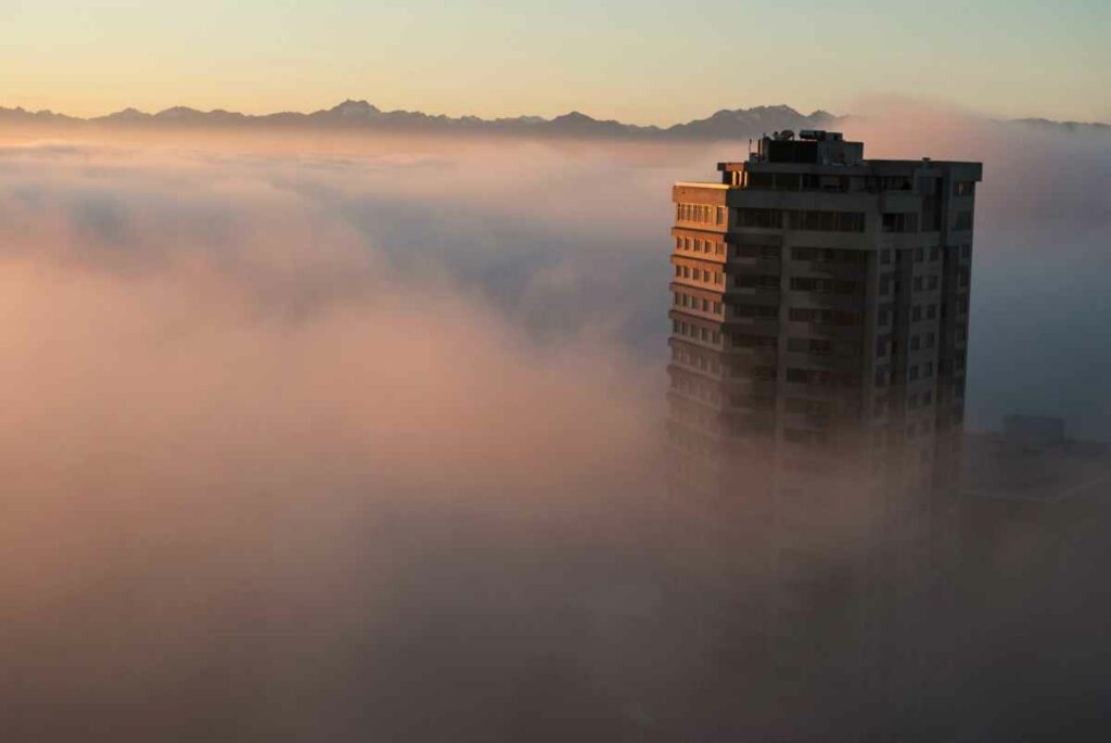 A Foggy Evening In Downtown Seattle. The Sun Was Setting Through The Waves Of Pink And Blue Clouds, Creating An Eery, Yet Beautiful Scene. Taken With A Nikon D3000 And 55mm Lens.