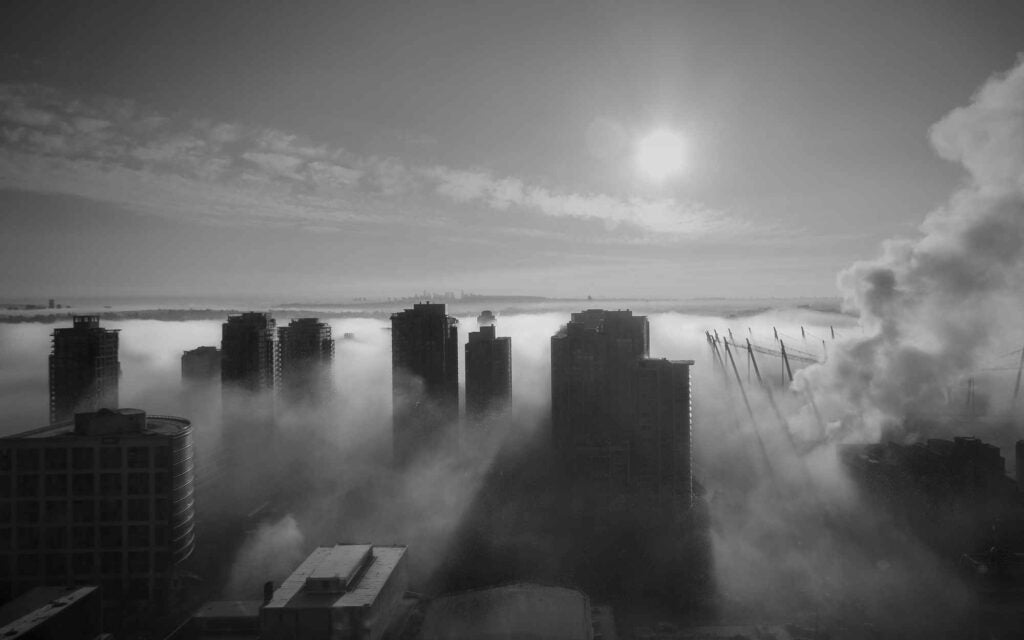 A thick autumn fog swept across Vancouver B.C.'s downtown core and I was greeted with this treat when I got to work.  Luckily I had my camera bag that day.<br />
Shot with a Canon T4i and a Sigma 10-20mm lens at 16mm, f8.0, 1/1250 sec shutter speed and 400 ISO.