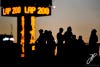 Fans silhouetted at the half way