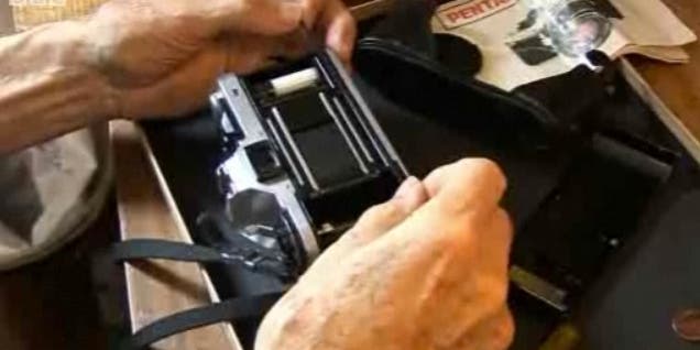 British Pensioner Raises Thousands For Charity By Repairing Cameras