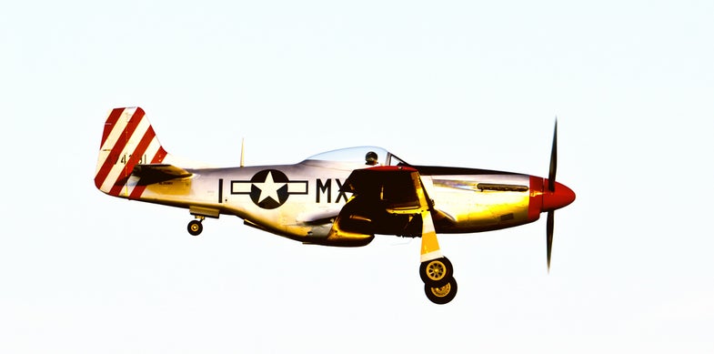 Happy 4th of July! Enjoy this most appropirate photograph, captured by Scott Novitsky, of a P-51 Mustang, photographed at the Battlecreek, Michigan air show.