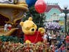Winnie-the-Pooh-waves-to-the-crowd-during-a-parade