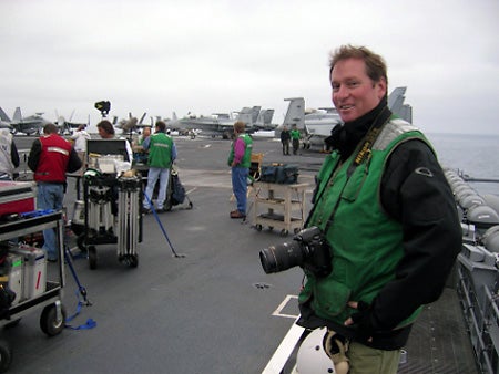 "Jasin-Boland-on-the-flight-deck-of-the-USS-Abraham"