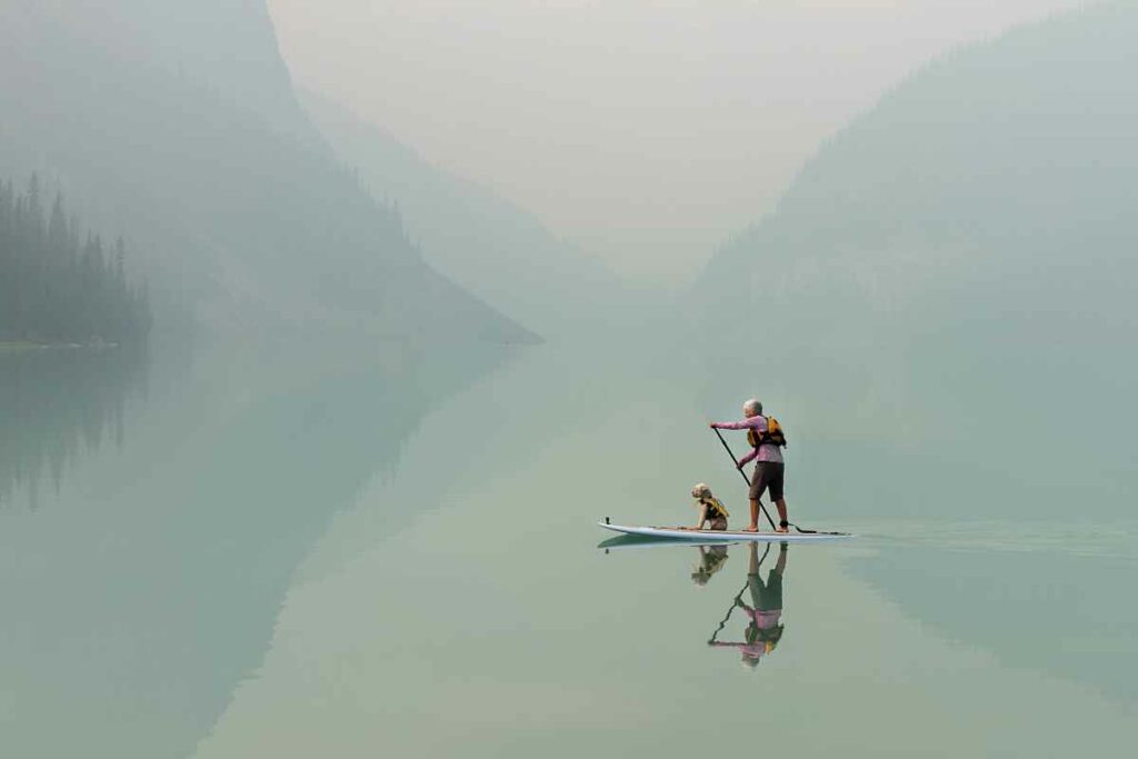 Due To Wildfires In Washington State, The Usually Picturesque View At Lake Louise Was Dampened By Heavy Smoke. This Woman And Her Dog Didn't Seem Discouraged. Shot With A Canon 6D, 50mm F/1.4 Lens. ISO 200, SS 1/400, F5.6