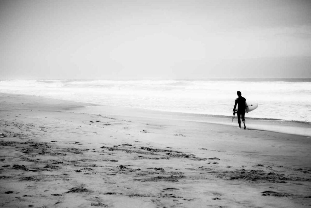 Surfin away. Mar Del Plata Beach, Argentina.