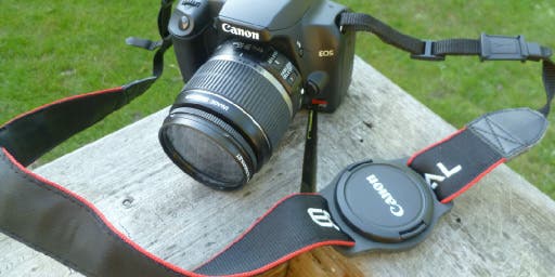 Innovative Lens Cap Holder Holds Your Caps on Your Strap Innovative Lens Cap Holder Holds Your Caps on Your Strap