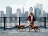 woman walking dog near world trade center