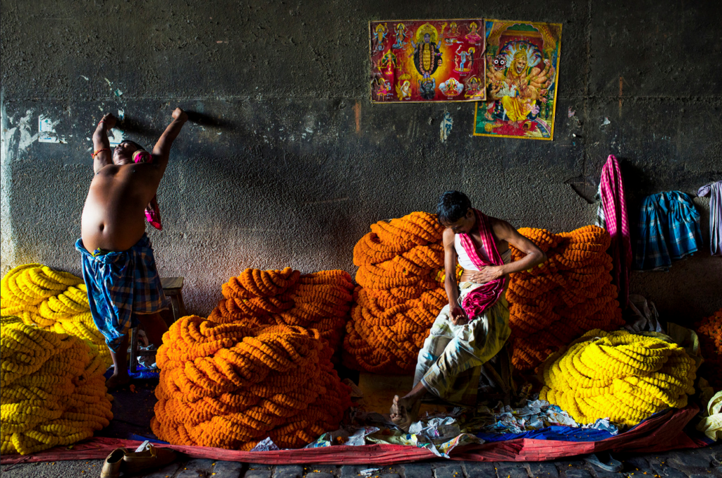 Today's Photo of the Day comes from Rakesh JV and was taken at a flower market in Kolkatta using a Nikon D800
with a 35mm f/1.4 lens at 1/125 sec, f/4 and ISO 1600. See more work <a href="https://www.flickr.com/photos/the_lightwave/">here. </a>