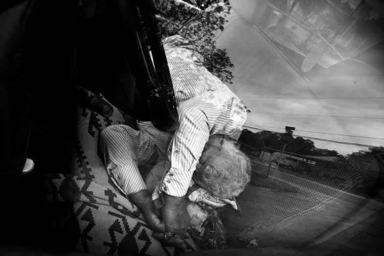 Man sleeping in car
